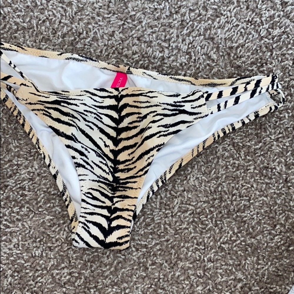 Victoria’s Secret bathing suit bottoms. Small.